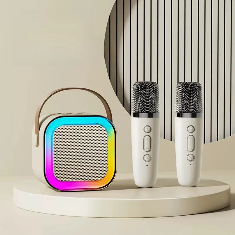 Colorful speaker and two microphones on a neutral background