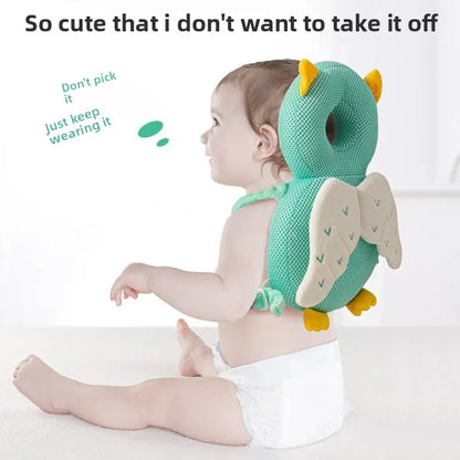 A baby wearing a green and yellow owl-shaped back support pillow, sitting on a white floor with promotional text on a white background.