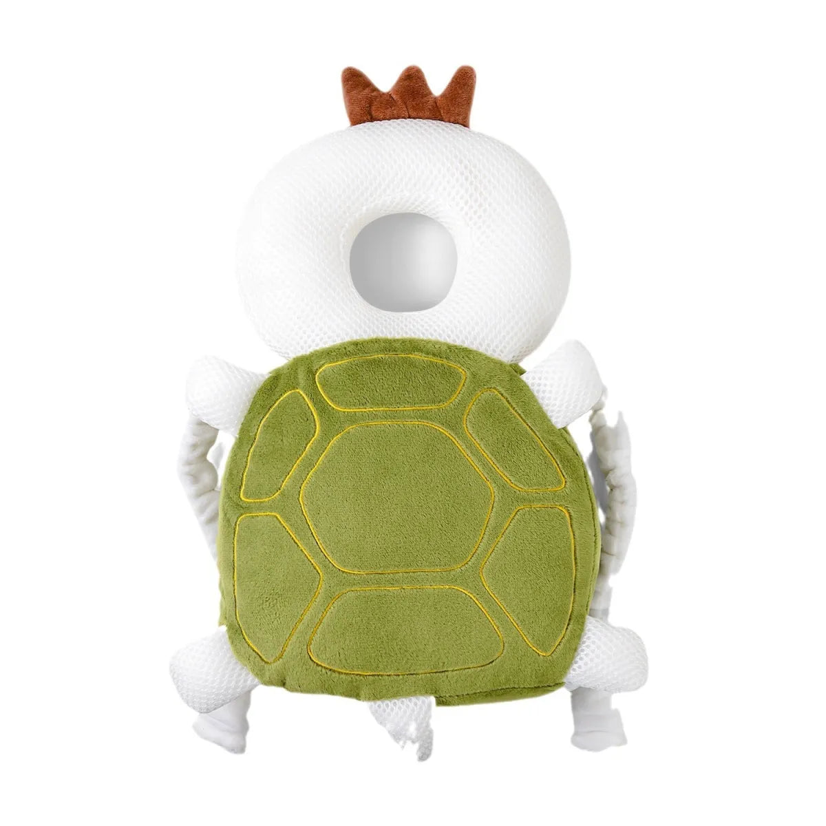 Toy figure of a turtle with a crown on a white background