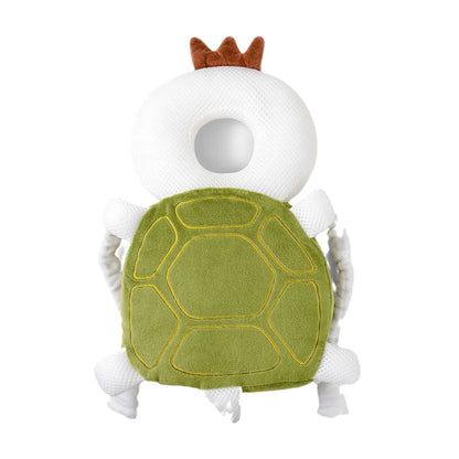 Toy figure of a turtle with a crown on a white background
