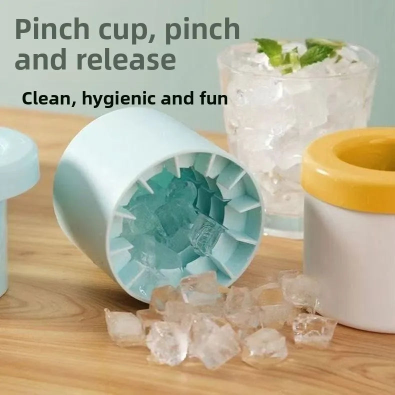 Ice cube tray with ice cubes on a wooden surface, text indicating 'Pinch cup, pinch and release' and 'Clean, hygienic and fun'.