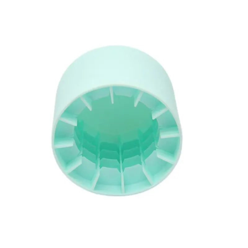 Light blue plastic cap with geometric pattern on a white background