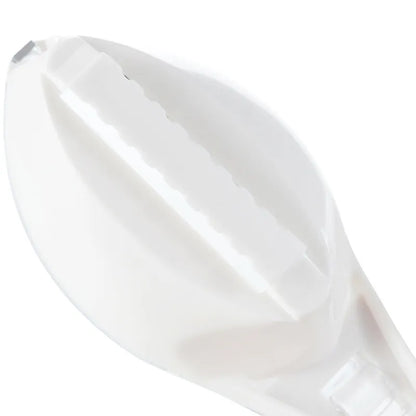 Close-up of a white spoon on a white background